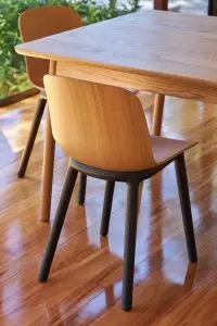 Acre chair at a table